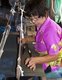 Thailand: Weavers in the Wiangyong district creating the famous Pha Mai Yok Dok silk fabrics, Lamphun, northern Thailand